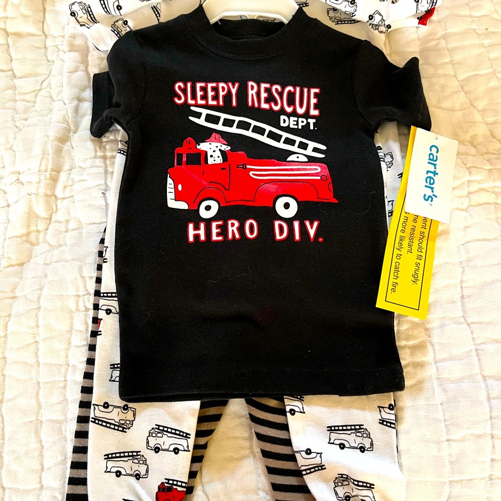 2 Carter’s pajamas. 12months NWT fire trucks